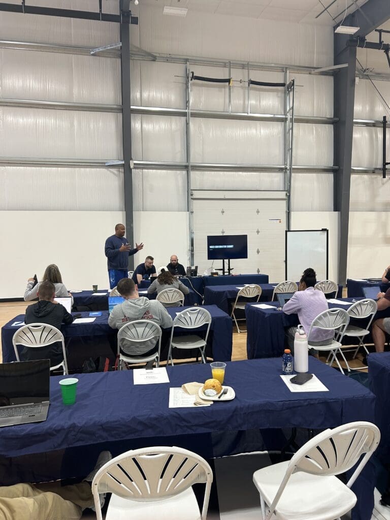 Davyeon Ross talking to a room of Video Coordinators